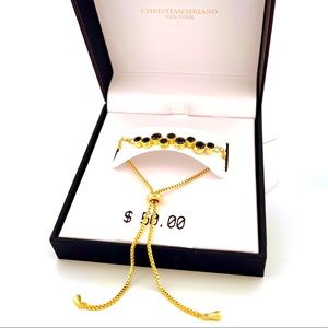 Christian Siriano Gold Tone Slider Bracelet With Black Stones